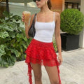 Pollera encaje flores con short y 4 volados lateral