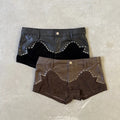 Short tiro bajo combinado y tachas