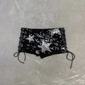 Short tiro bajo engomado lentejuelas estrellas